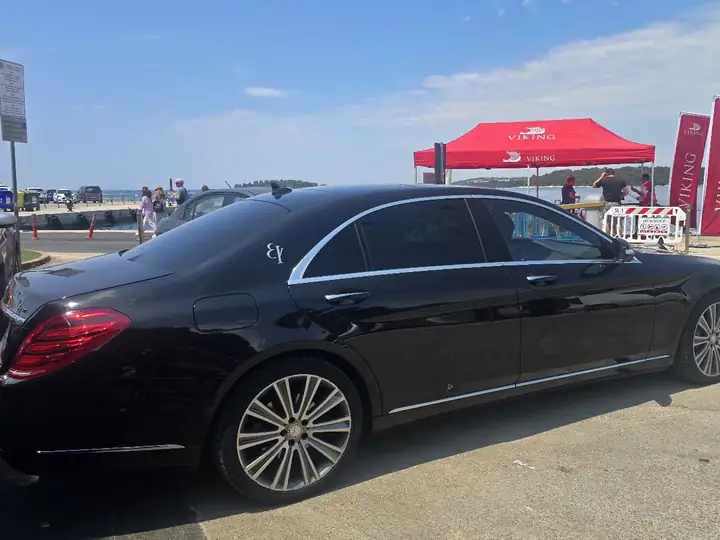 Mercedes S-Class waiting at the port